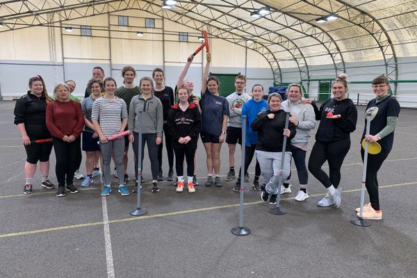 Pendennis employees with rounders team members following a game