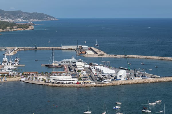 Aerial view of Pendennis Vilanova marina and America's Cup team base during regatta preparations.