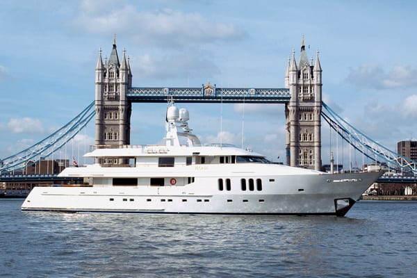 Superyacht Ilonka cruising on the River Thames with Tower Bridge in the background.