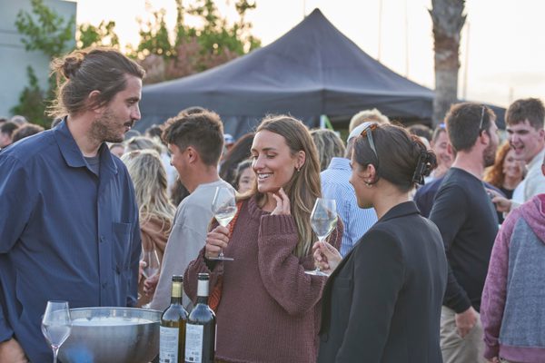 Guests enjoying a wine tasting at Pendennis Vilanova marina during the Temps de Vi event.