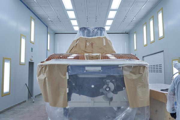 Cockwells tender masked and prepped for spraying inside Pendennis Vilanova's paint facility.