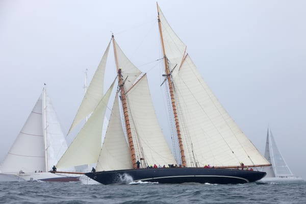 Schooner Mariette sailing at speed during the 2012 Pendennis Cup with other yachts in the background.