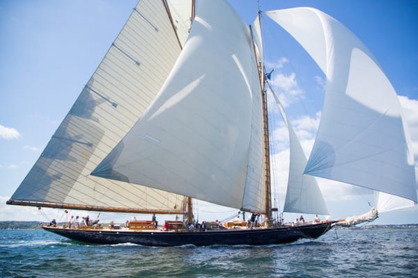 Mariette gliding under full sail during the 2014 Pendennis Cup on a clear summer day.