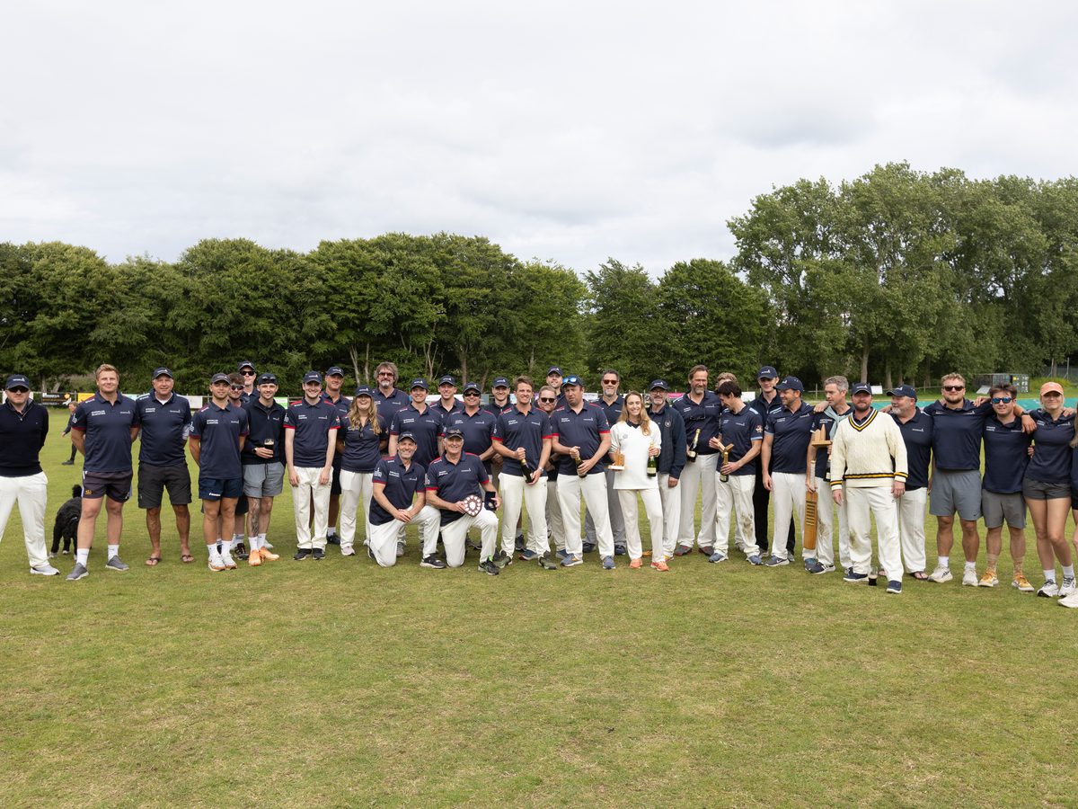 Team photo on the cricket pitch