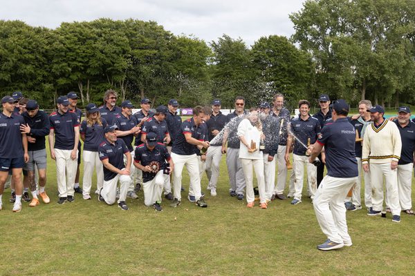 Team photo on the cricket pitch