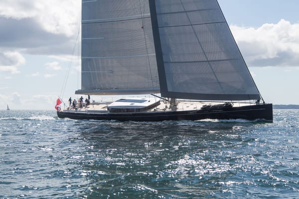 G2 under sail during sea trials, with crew on deck and sails fully raised in open water.