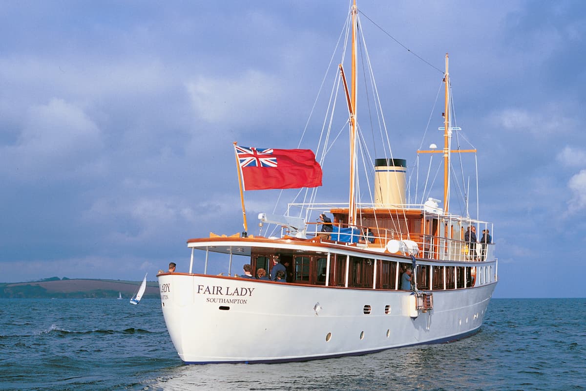 Classic motor yacht Fair Lady underway during sea trials, flying the Red Ensign.