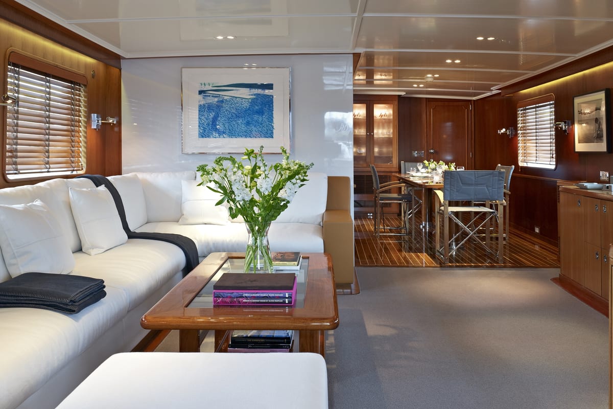 Heavenly Daze saloon and dining area featuring Wetzels Brown Partners’ modern interior redesign with rich wood finishes and neutral furnishings.