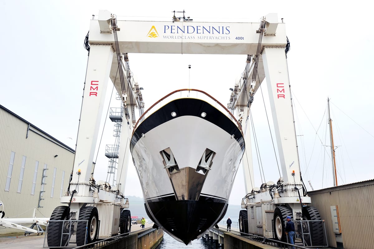 Heavenly Daze suspended in a 400t Pendennis travel hoist during her relaunch after 2012 restoration.