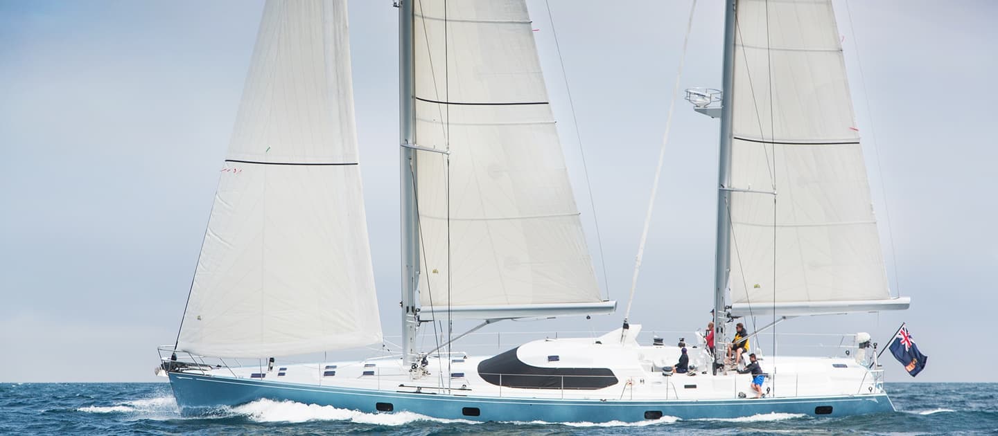 Lady K sailing at speed during sea trials, with full sails set and crew on deck after 6-month refit.