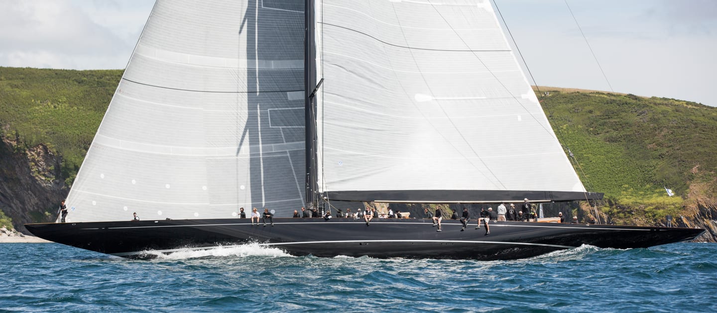 Classic J Class yacht Lionheart sailing at speed during a race in Falmouth.