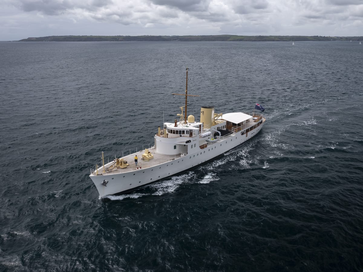 Superyacht Marala underway during sea trials off the coast of Falmouth under overcast skies.