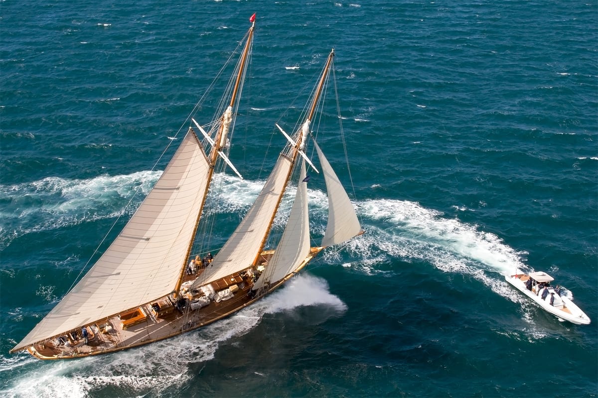 Classic schooner Mariette racing under sail with a chase boat alongside during the 2008 Pendennis Cup.
