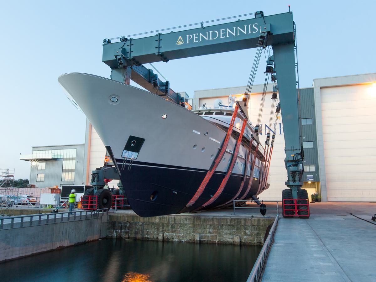 A large yacht in a travel hoist