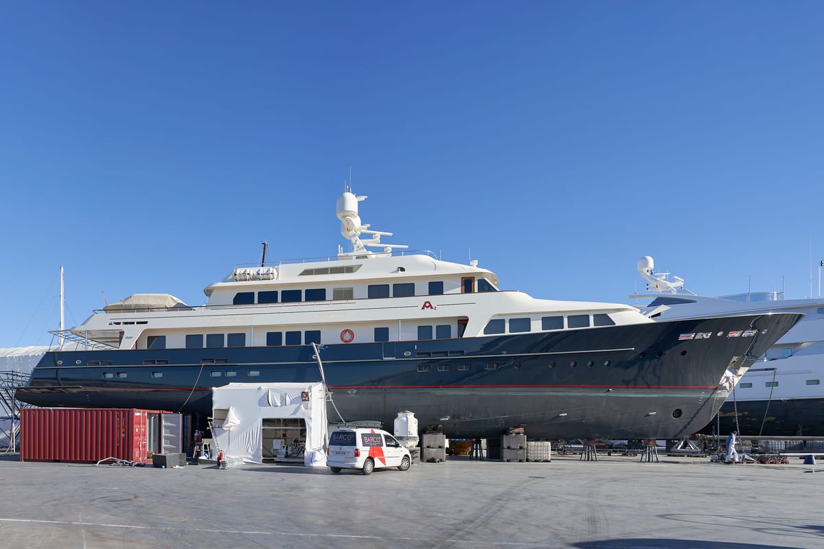 Full length image of motor yacht on the hardstanding